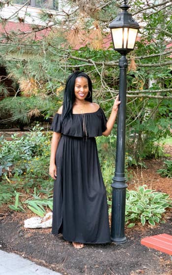 reviewer wearing the dress in black