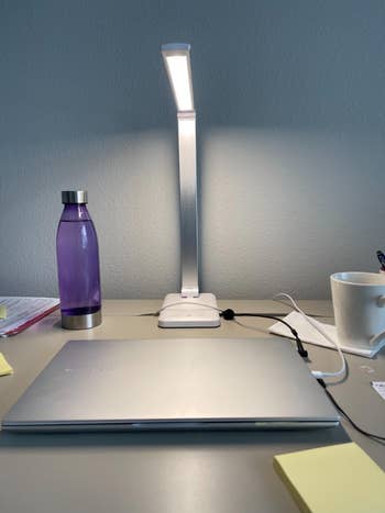 Another reviewer image of the lamp directly over a laptop