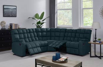 lifestyle photo of deep teal sectional couch with reclining footrests