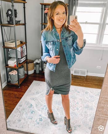reviewer wearing the dress in grey