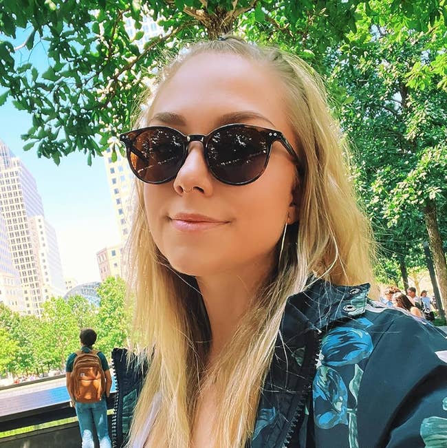 model wearing tortoise ammunition sunglasses