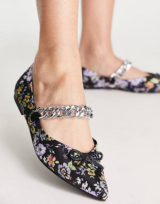 black pointy toe floral flats with silver chain strap