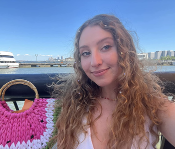 reviewer with the blinger hair gems in their hair