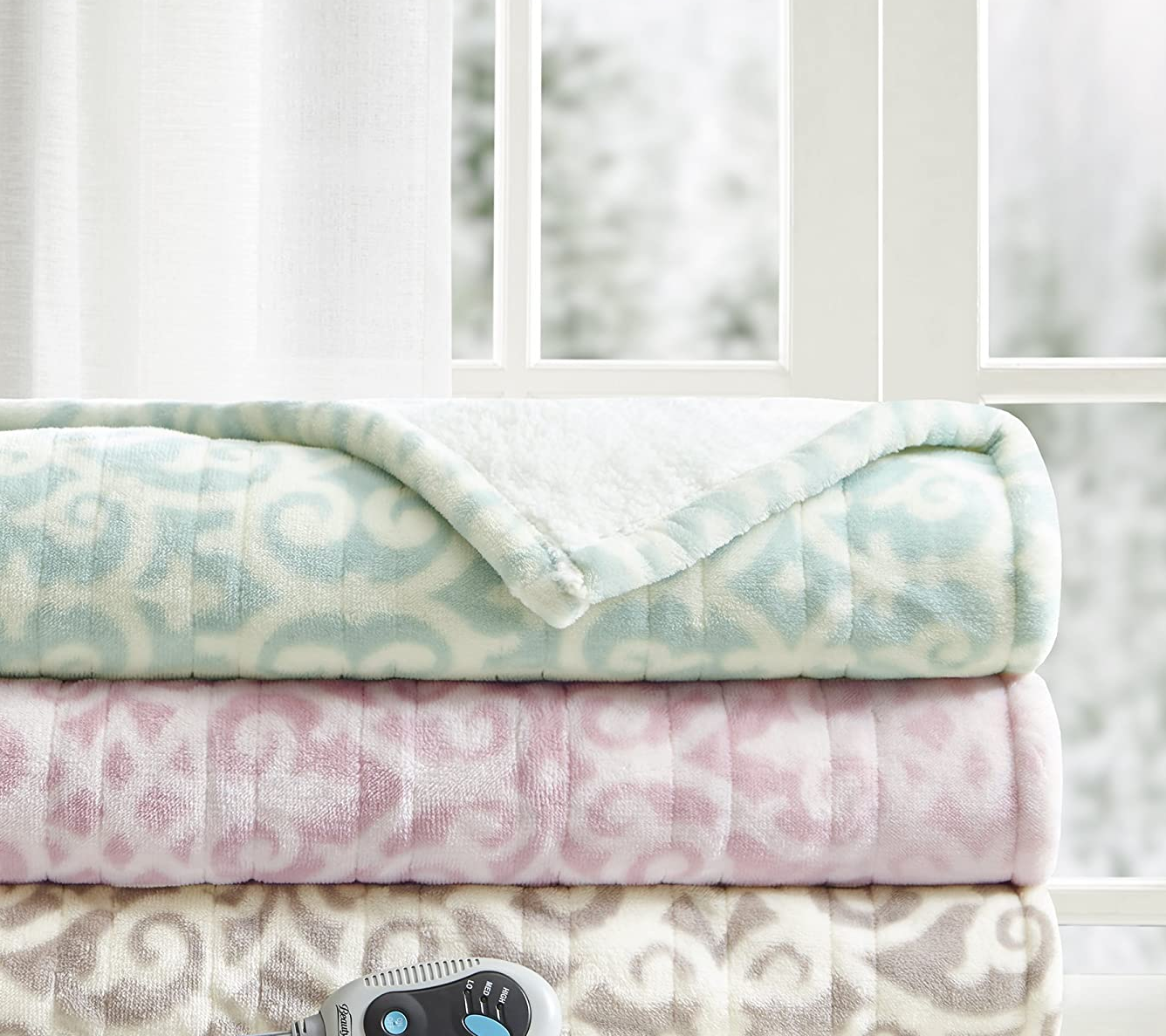 15 Best Heated Blankets To Stay Warm And Cozy Under