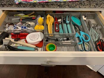 reviewer's kitchen drawers looking overly full and cluttered