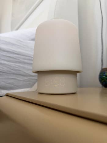 58, placed connected  a bedside array  adjacent  to a pillow