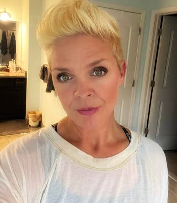 Person with abbreviated  styled hairsbreadth  and relaxed expression, wearing a casual achromatic  top, successful  a location  setting