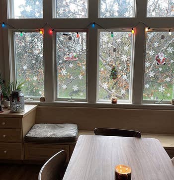 reviewer photo of the snowflake decals on four windows