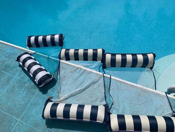 three inflatable water hammocks in a pool