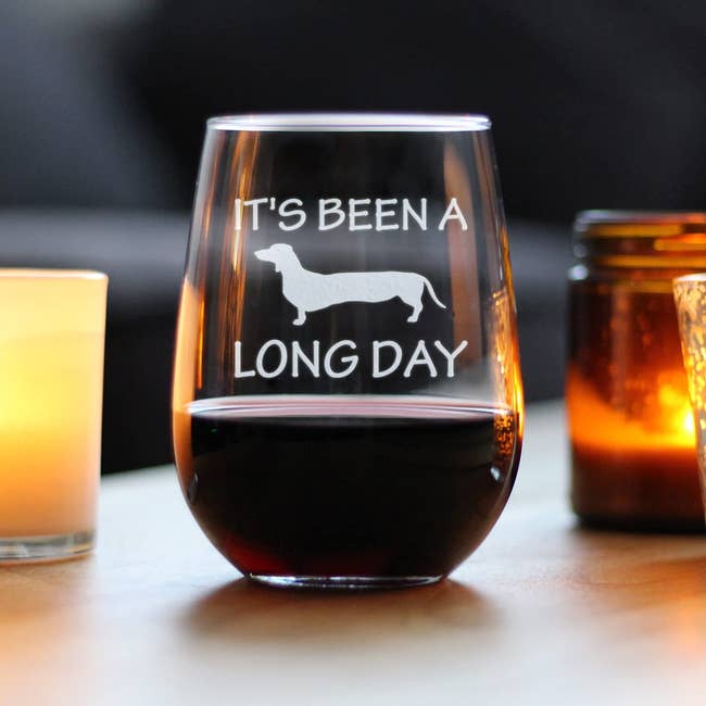 The wine glass that says 