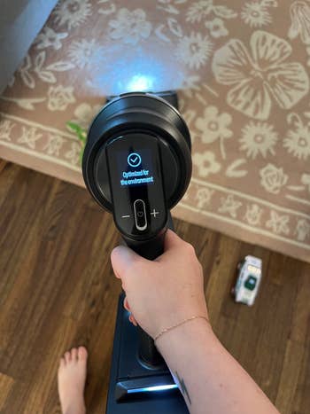 hand holding the vacuum