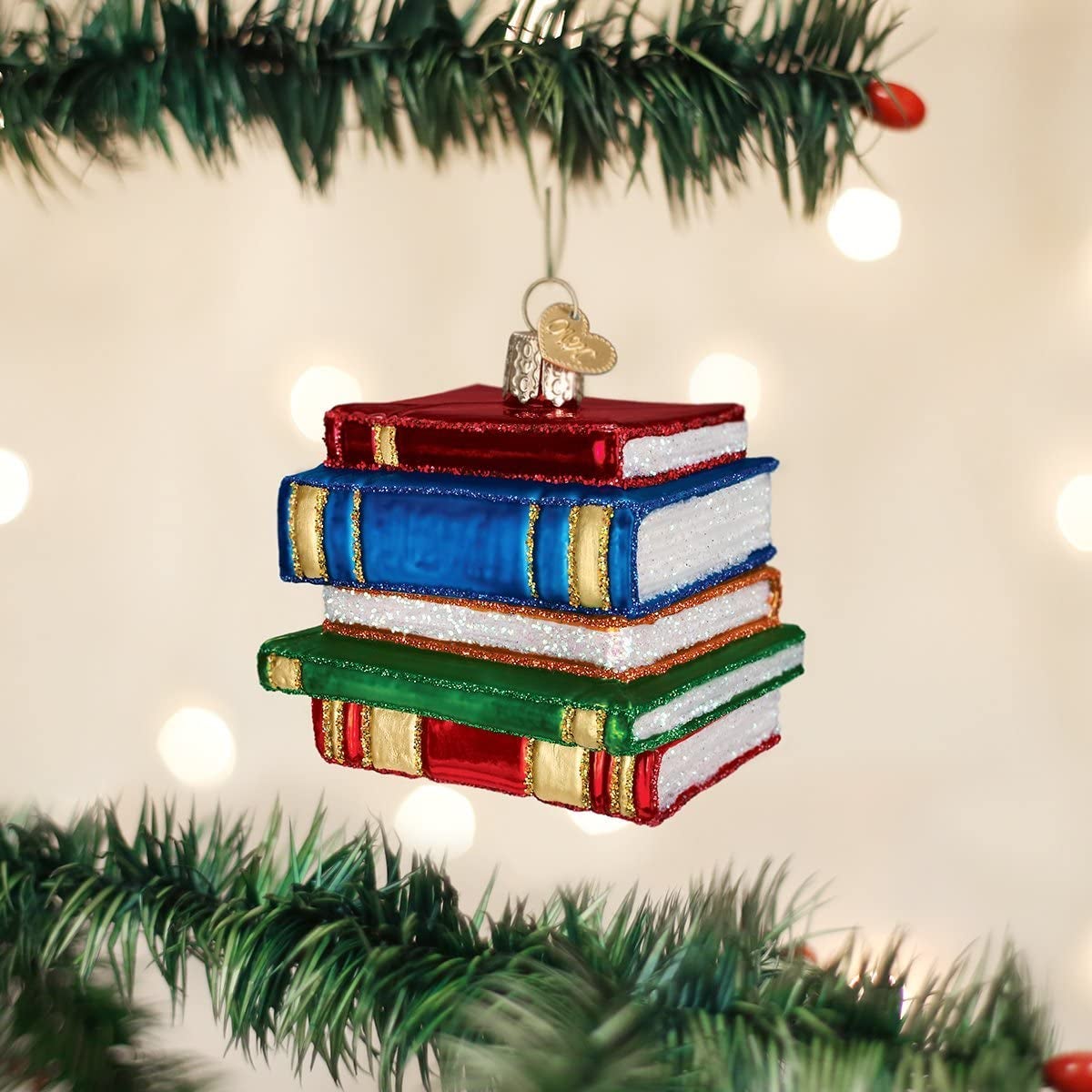 a metal ornament of a stack of books
