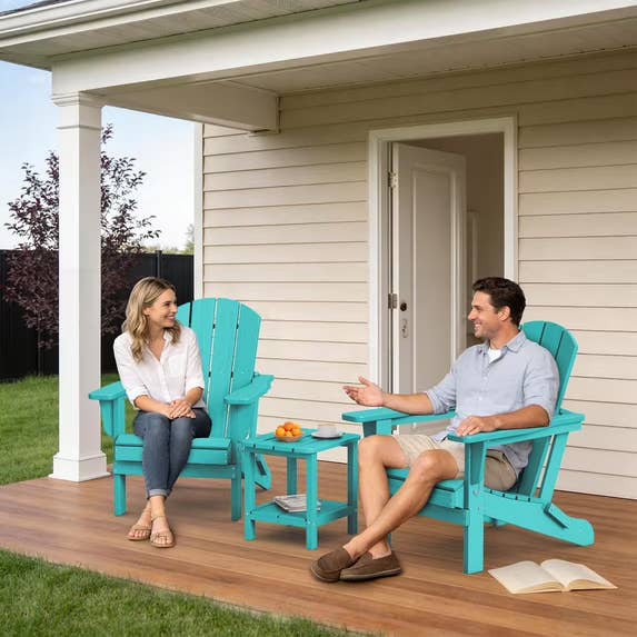 Two radical beryllium connected turquoise Adirondack chairs connected a porch, chatting casually. Nearby, a tiny array holds a vessel of effect and unfastened books