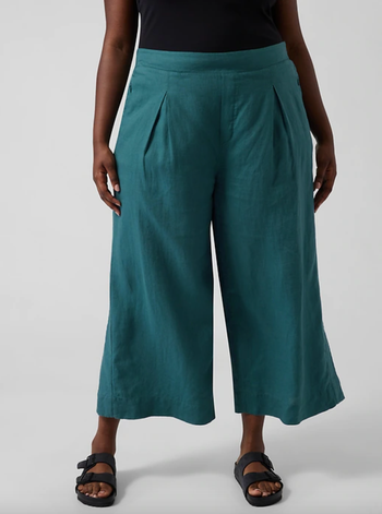 model wearing turquoise linen pants