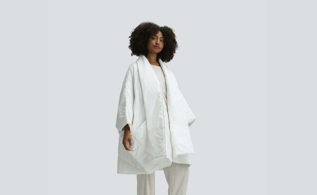 Model wearing white coat
