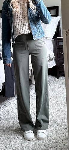 Person successful  a casual outfit with a jean jacket, knit sweater, grey  wide-leg pants, and achromatic  sneakers, lasting  successful  a chamber  setting