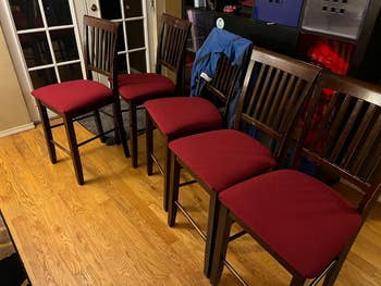 same reviewer's set of chairs with red seat covers on cushions