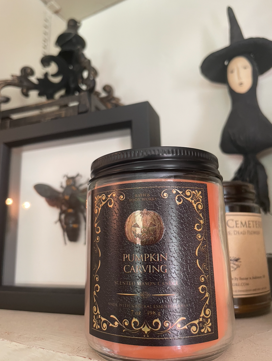 my candle on a bookshelf 