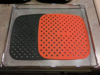 Black and red square liners with ventilation holes in them