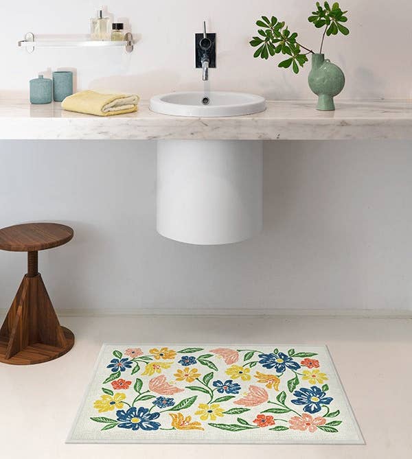 a floral ruggable bath mat