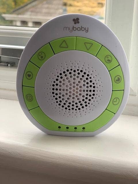 White noise machine placed by window