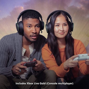 two models wearing headsets and gaming