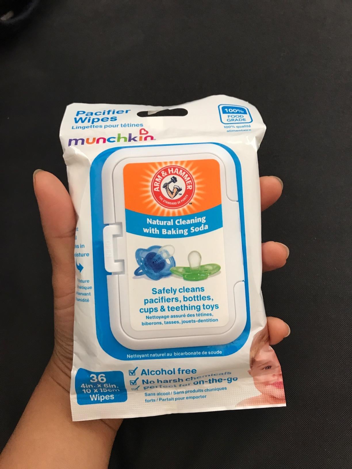 reviewer holding pack of 36 wipes