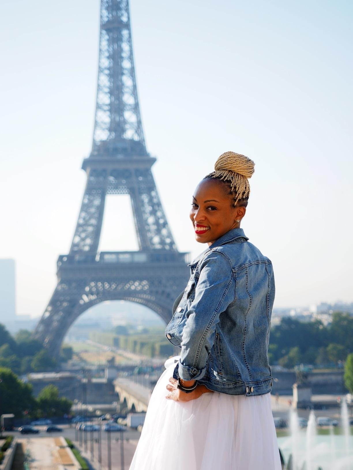 a reviewer poses in the jacket in Paris