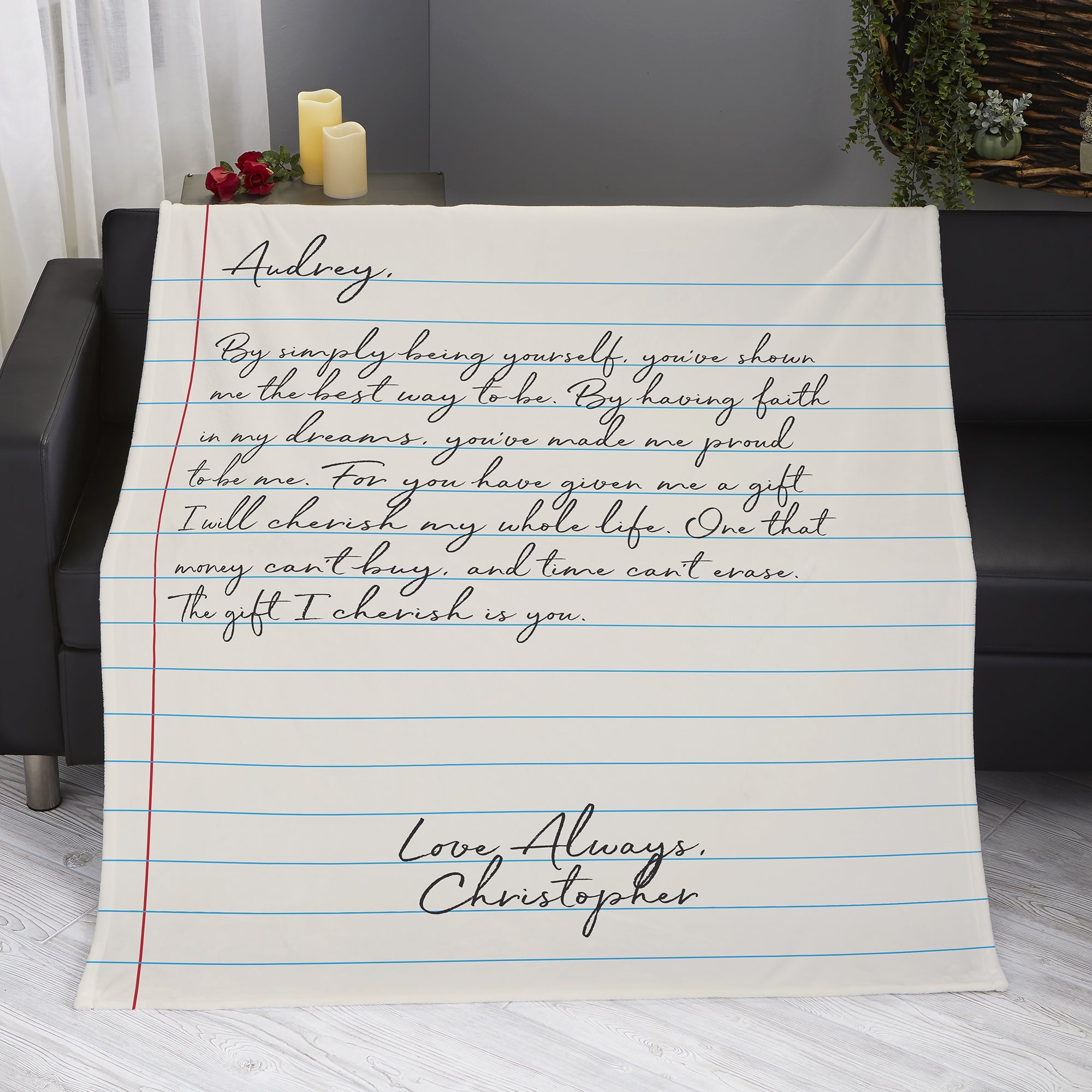 the blanket printed to look like notebook paper with a love letter written on it