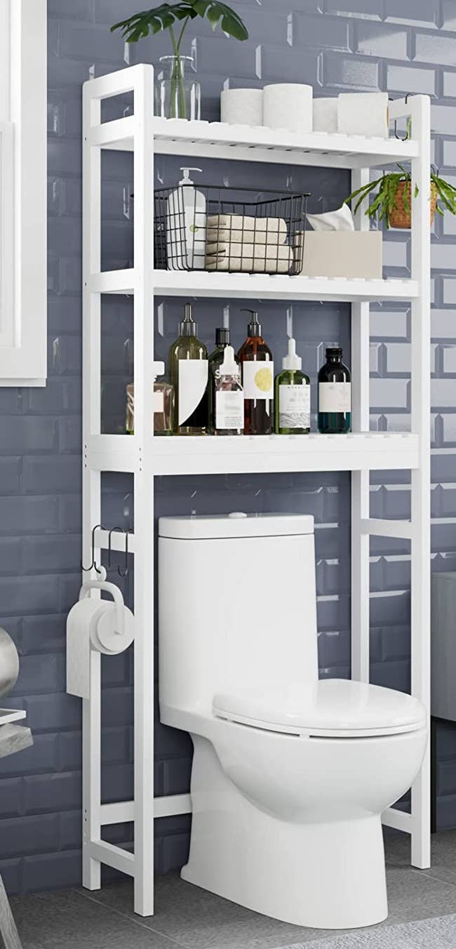 White over the toilet three-tier shelf with S hooks on the side