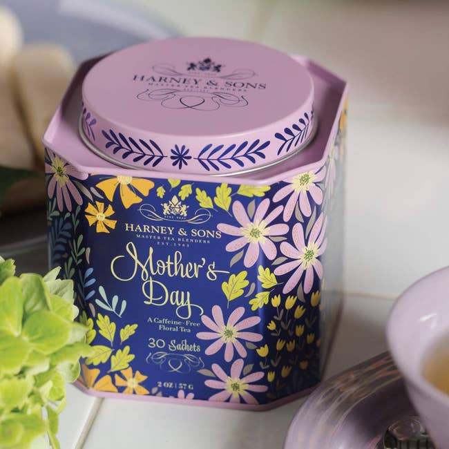 the ornate blue and purple floral tin of mother's day tea
