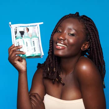 a model holding the braid care kit