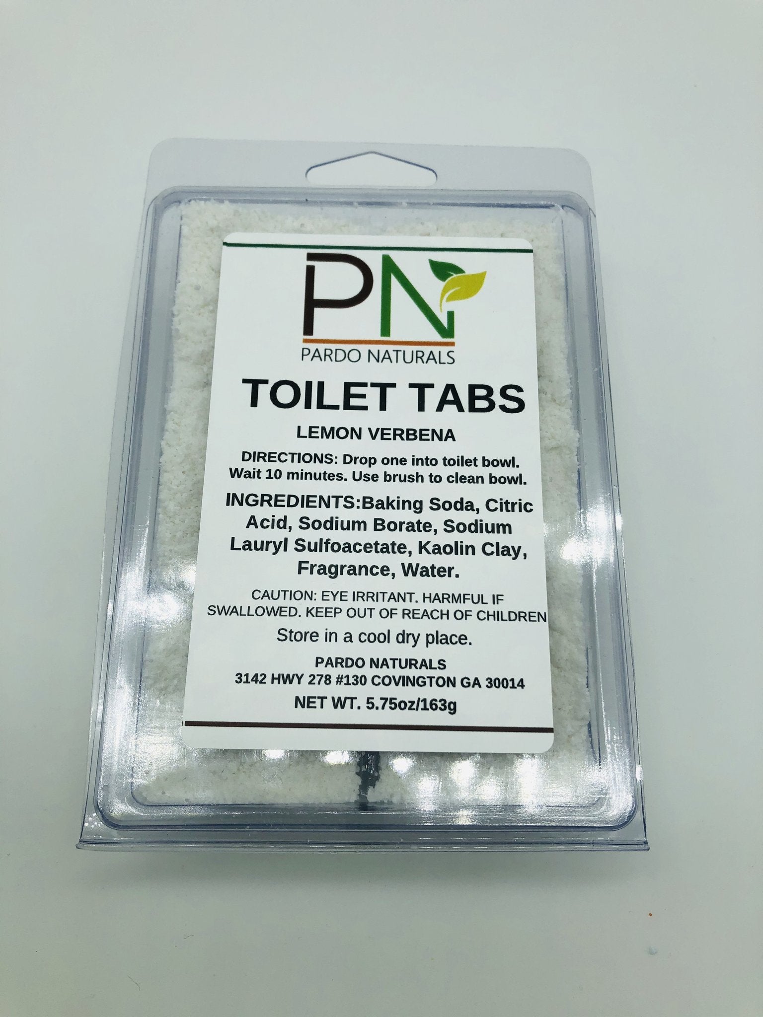 The plastic container with six white square tabs in it