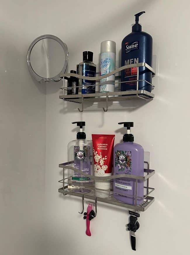 Shower support  with assorted  grooming products, including Suave Men's shampoo and conditioners, positive  a hanging razor