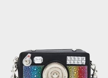 black bag shaped like a camera with rainbow jewels