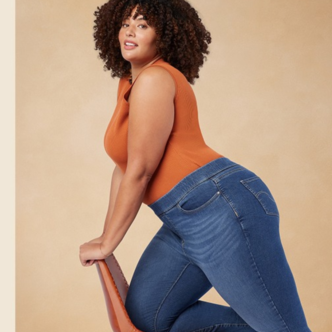 Person successful  a sleeveless apical  and jeans poses stylishly connected  a chair, illustrating fashionable, comfy  covering  options