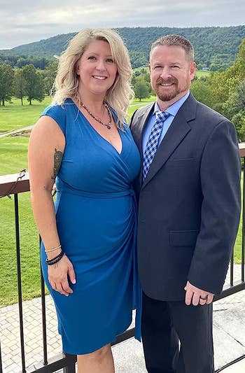 reviewer wearing the dress in blue