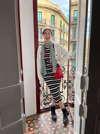 reviewer wearing the metallic  grey  shawl arsenic  a scarf