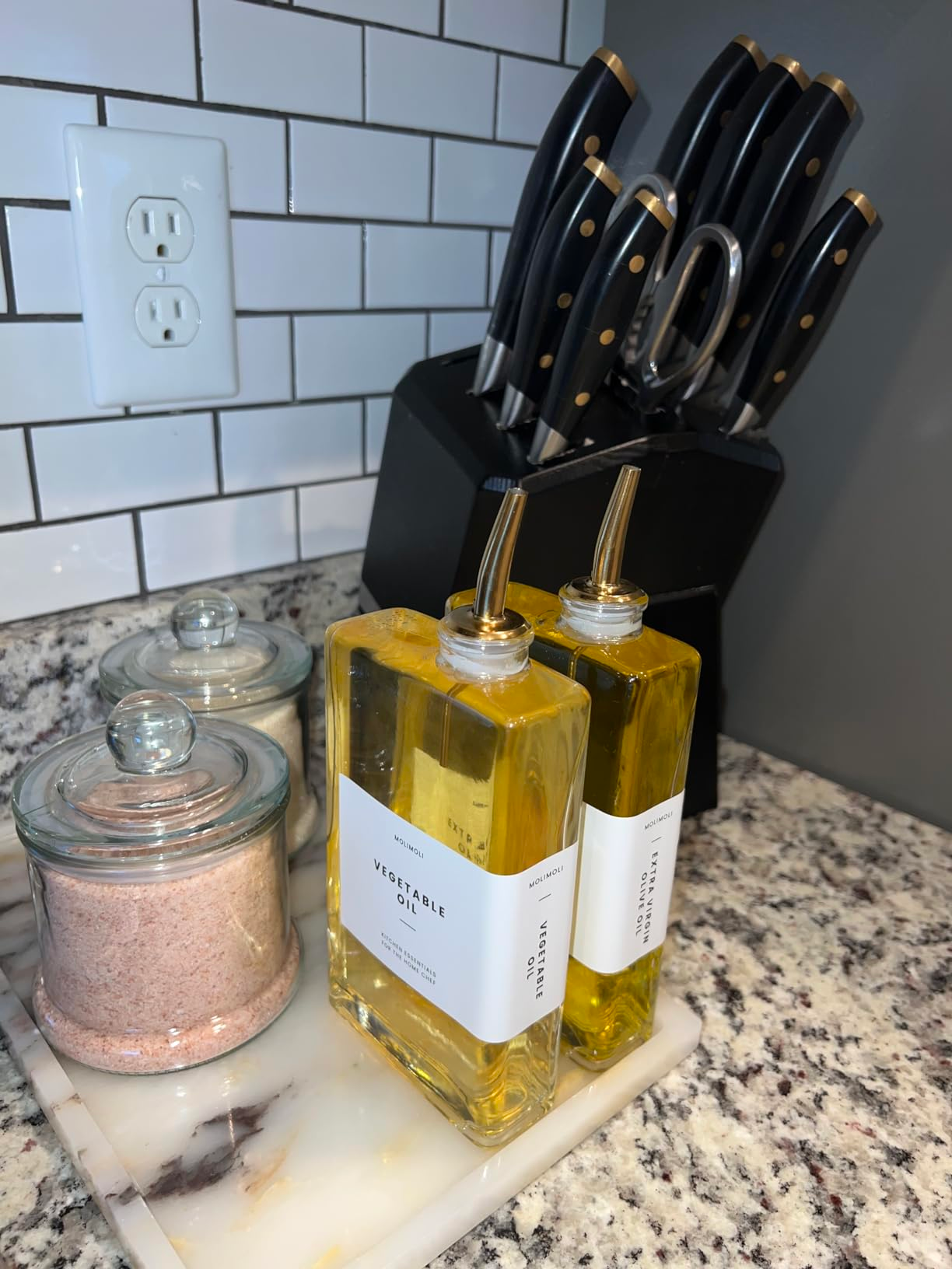 reviewer's room  countertop with weapon  artifact  set, pinkish  Himalayan brackish  successful  lidded jars, and 2  of the narrowm labeled rootlike  lipid  bottles with stainless alloy  pumps