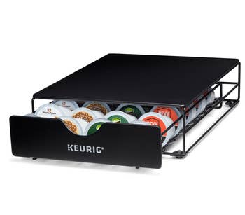 Keurig coffee pod drawer organizer with rows of assorted coffee pods visible