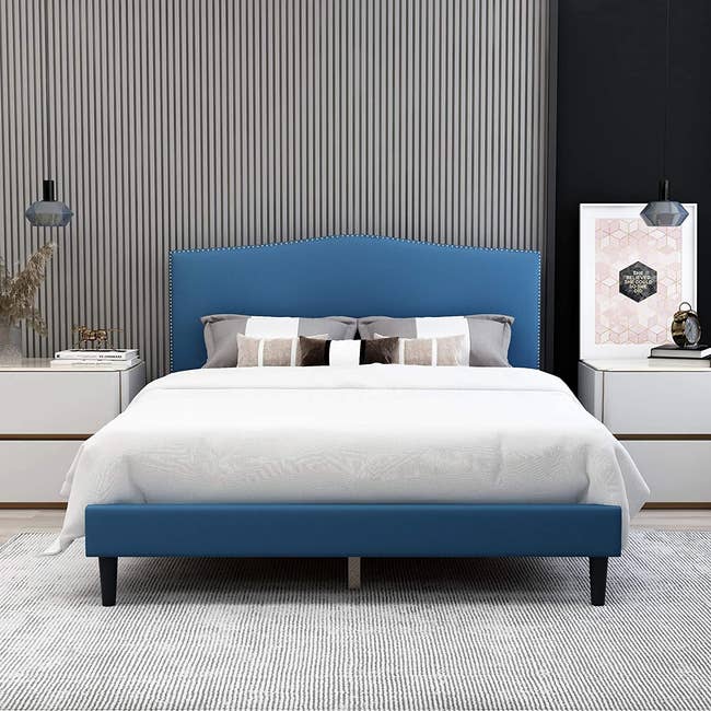 the upholstered bed in blue