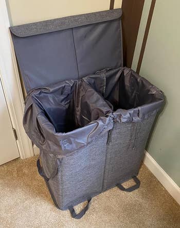 Reviewer image of the gray hamper with the lid up 