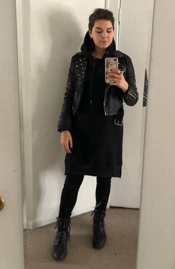 another reviewer wearing the dress with a leather jacket and leggings
