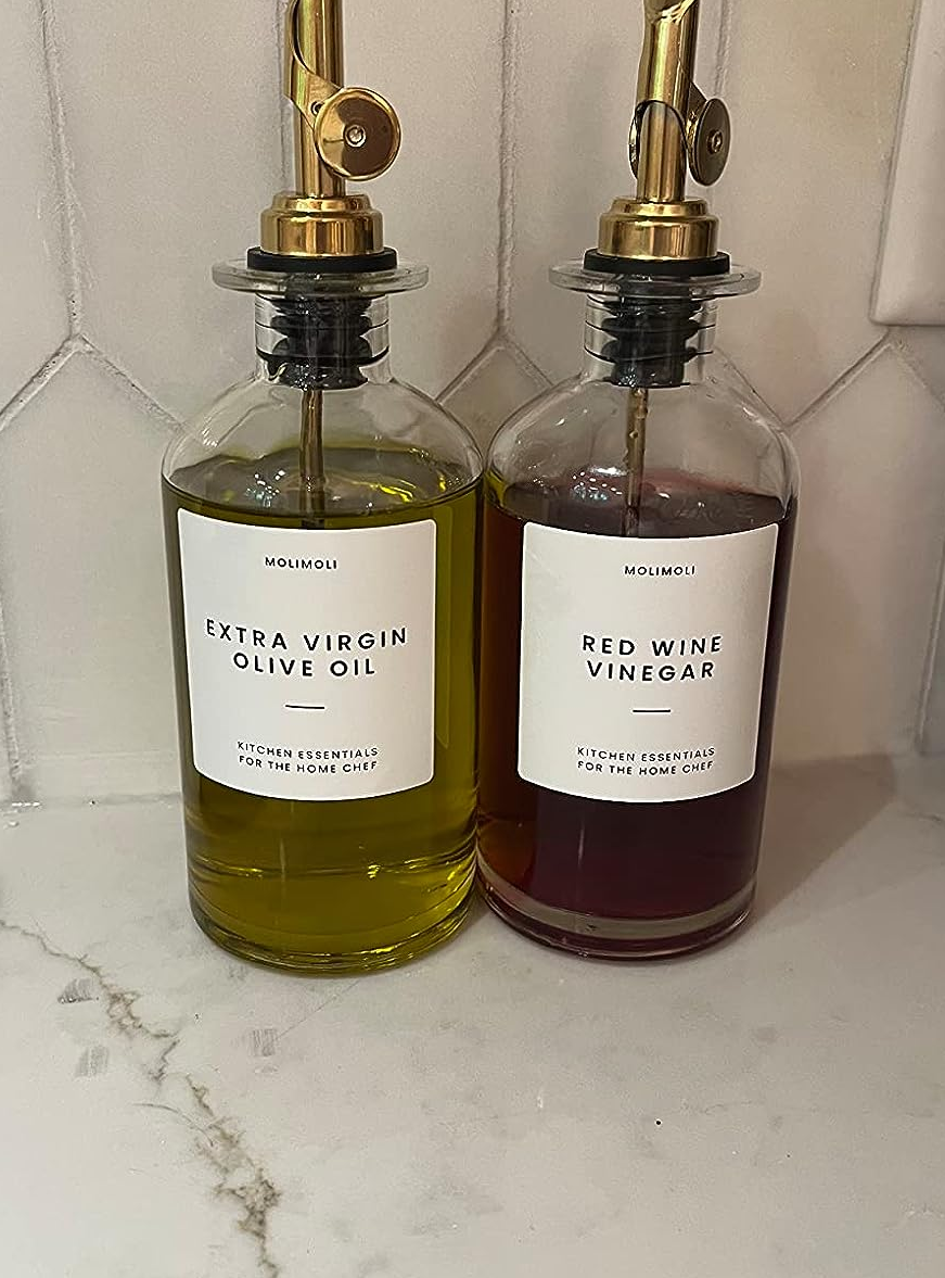 a reviewer's bottles of olive oil and crimson wine vinegar