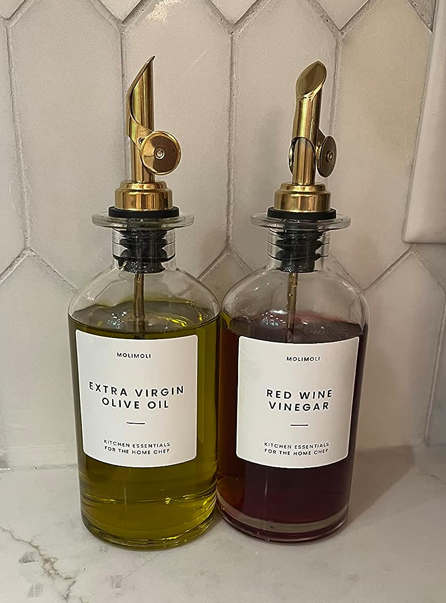 a reviewer's bottles of olive oil and crimson wine vinegar