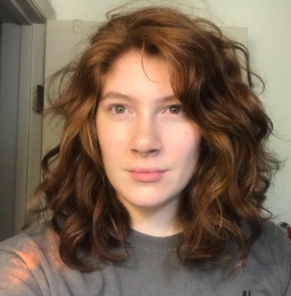 reviewer with soft looking waves in hair