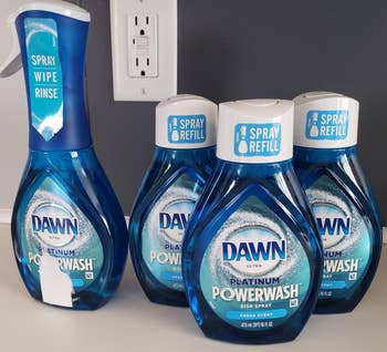 Reviewer's Dawn Powerwash spray and three refills