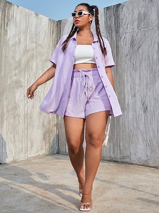 A model walking in the lavender purple set