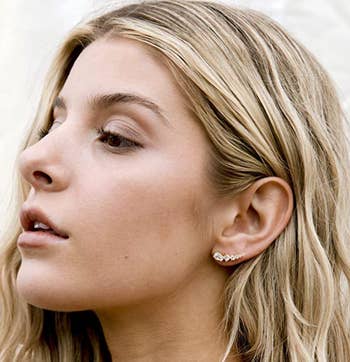 model wearing ear climber on ear lobe