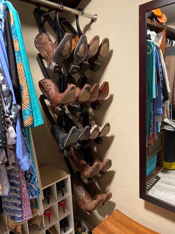 reviewer photo of several boot racks in closet